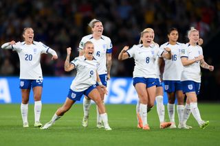 Chloe Kelly of England celebrates scoring her team's fifth and winning penalty in the penalty shoot out during the FIFA Women's World Cup Australia & New Zealand 2023 Round of 16 match between England and Nigeria at Brisbane Stadium on August 07, 2023 in Brisbane, Australia. (Photo by Justin Setterfield/Getty Images)