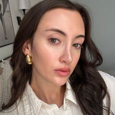 Beauty editor Alyssa Brascia testing and wearing a foundation stick.