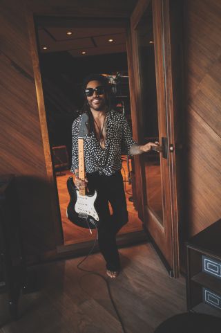 Lenny Kravitz in the studio with his 1969 Fender Strat with a custom Black finish