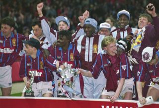 Aston Villa players celebrate their League Cup final win over Manchester United in March 1994.