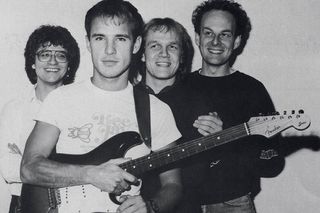 Alan Murphy (front) holds his ’62 Squier Strat with the other members of the Fender Hot Squad