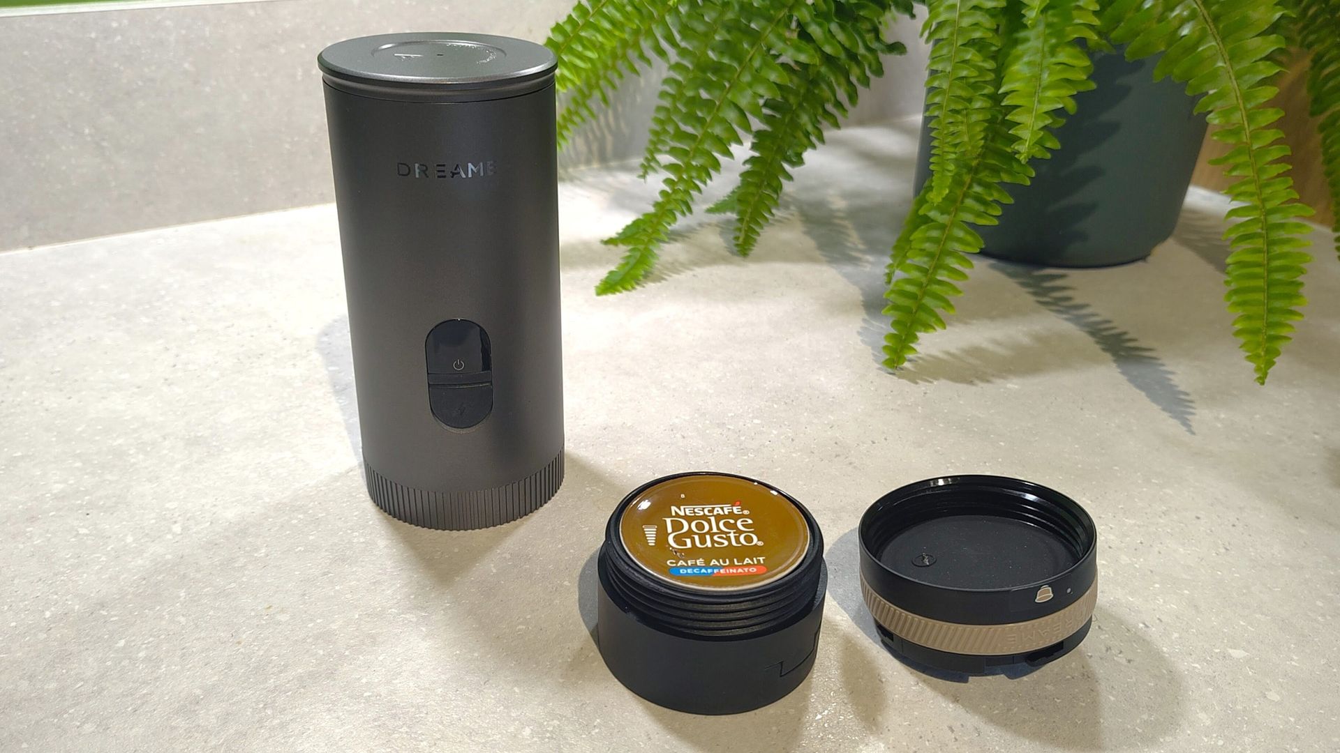 Dreame Ecceluxe Go coffee maker with Dolce Gusto coffee pod inside