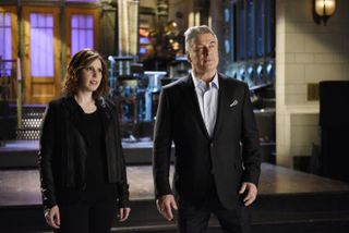 vanessa bayer and alec baldwin in front of the snl stage