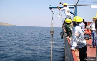 Researchers conduct sediment coring to retrieve samples from Lake Tanganyika's floor.