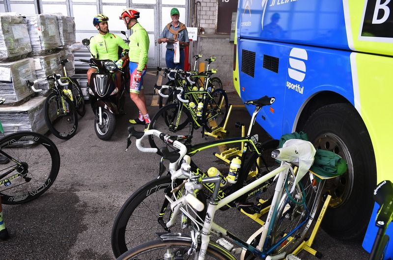 Daniele Bennati and Michael Valgren playing around at the Tinkoff-Saxo team bus