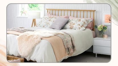 Neutral bedroom with a wooden bed layered with soft pastel bedspreads and cushions