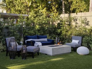 A backyard with a blue and white color scheme