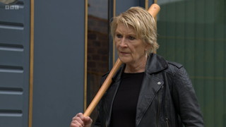 Shirley Carter with a baseball bat in EastEnders