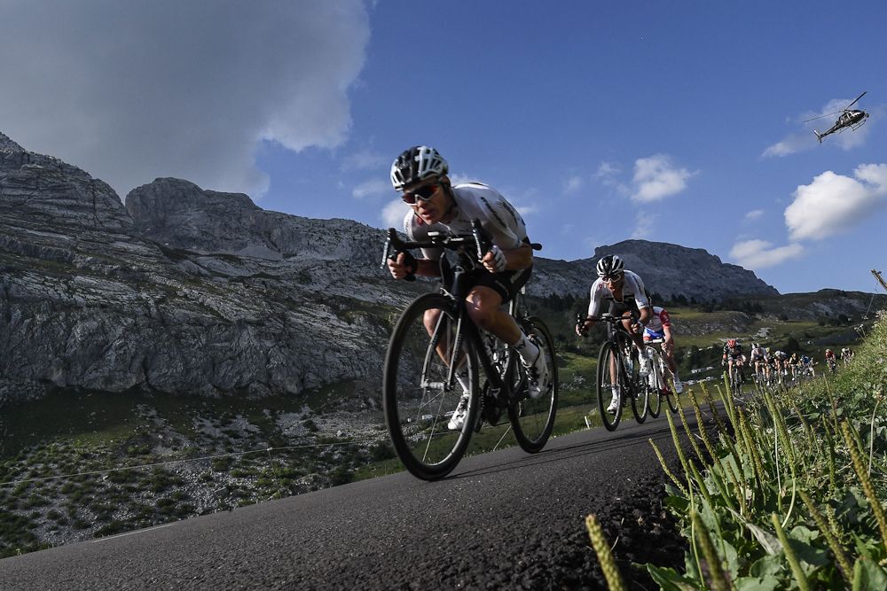 Chris Froome tucks on a descent during stage 10 at the Tour de France