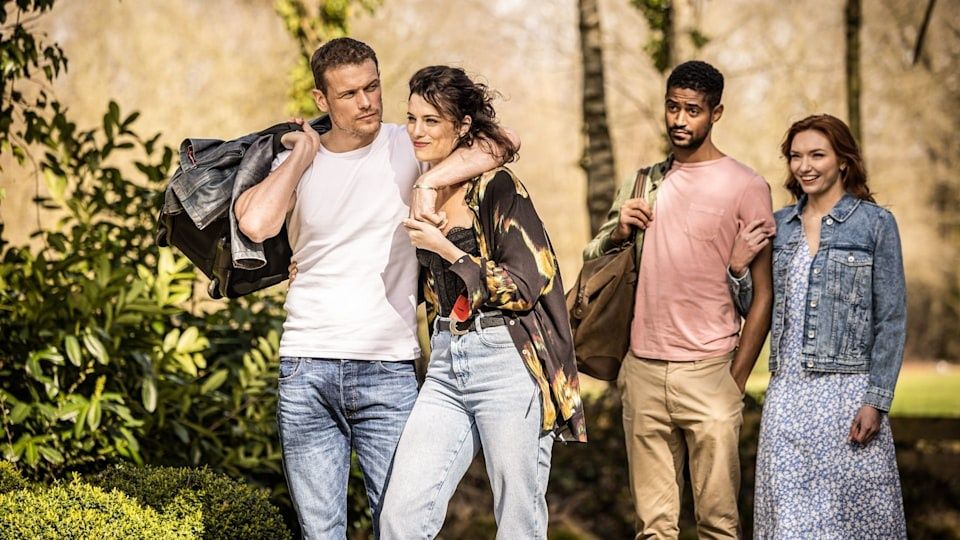 Danny (played by Sam Heughan) and Becky (Jessica de Gout) and Pete (Alfred Enoch) and Evie (Eleanor Tomlinson) on a double date in &quot;The Couple Next Door&quot;