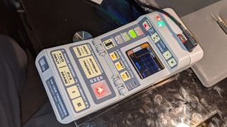 A prototype build of the Tricorder project lays on a desk