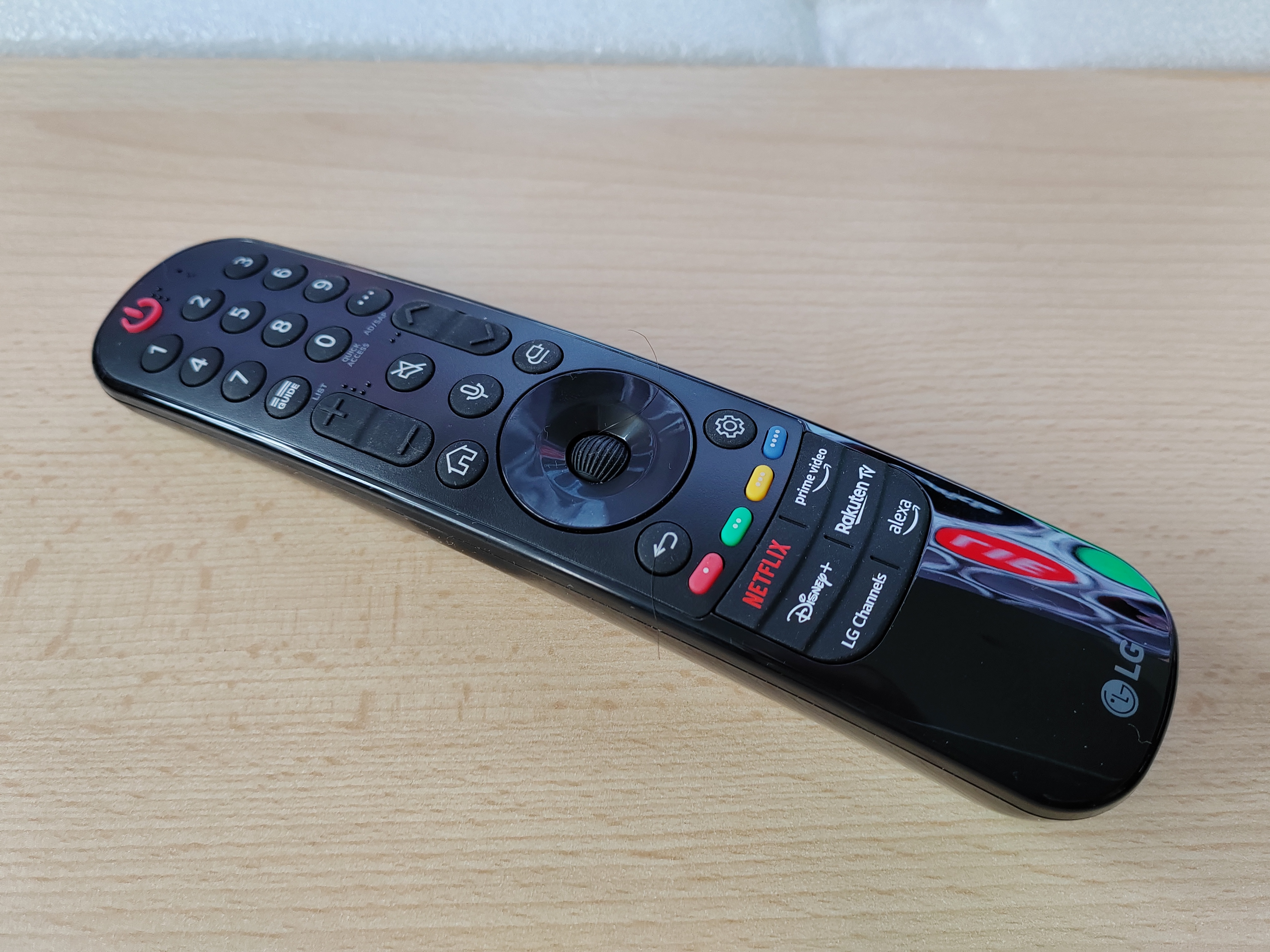 LG OLED G3's remote control, showing its bespoke buttons for Netflix, Disney+, Prime Video, and Rakouten TV