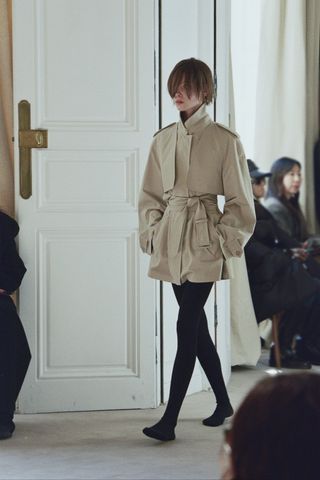 A model walks The Row's winter 2025 runway.