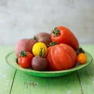 table with vegetables on green coloured plate