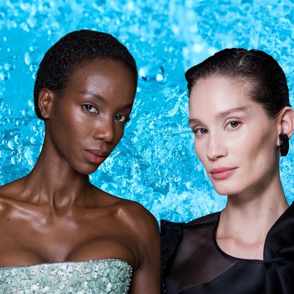 Two models posing in front of a background of water.