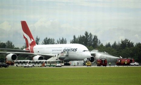 A Qantas A380 makes a safe emergency landing in Singapore after suffering engine failure just after take off.