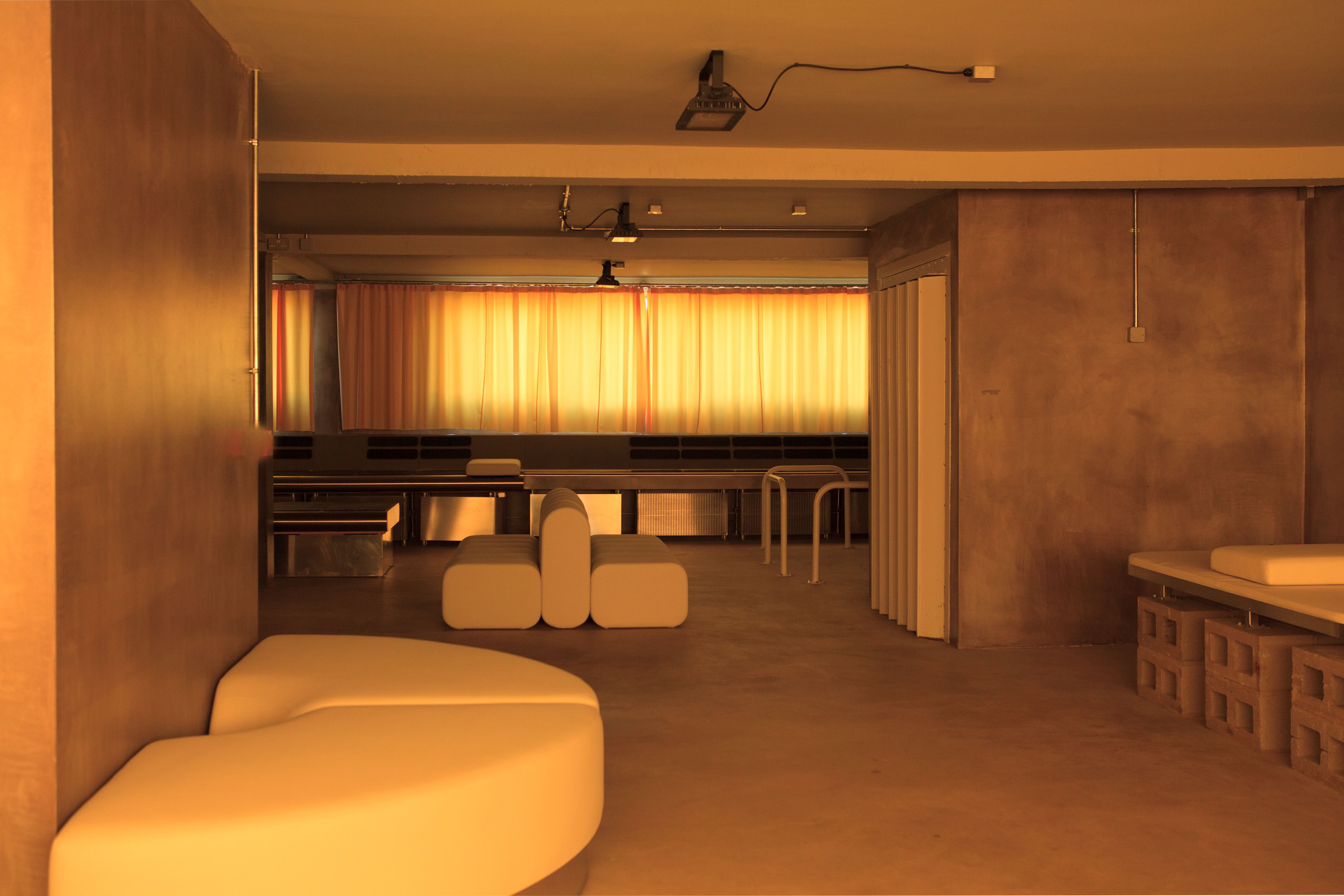 view of a new space in Dalston for intimacy, work and community, where concrete structures sit alongside rubber-cast seating