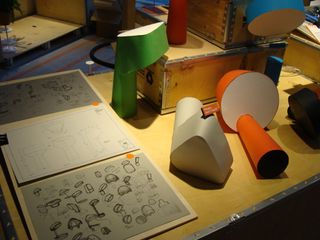 Working models and process sketches of a desk light