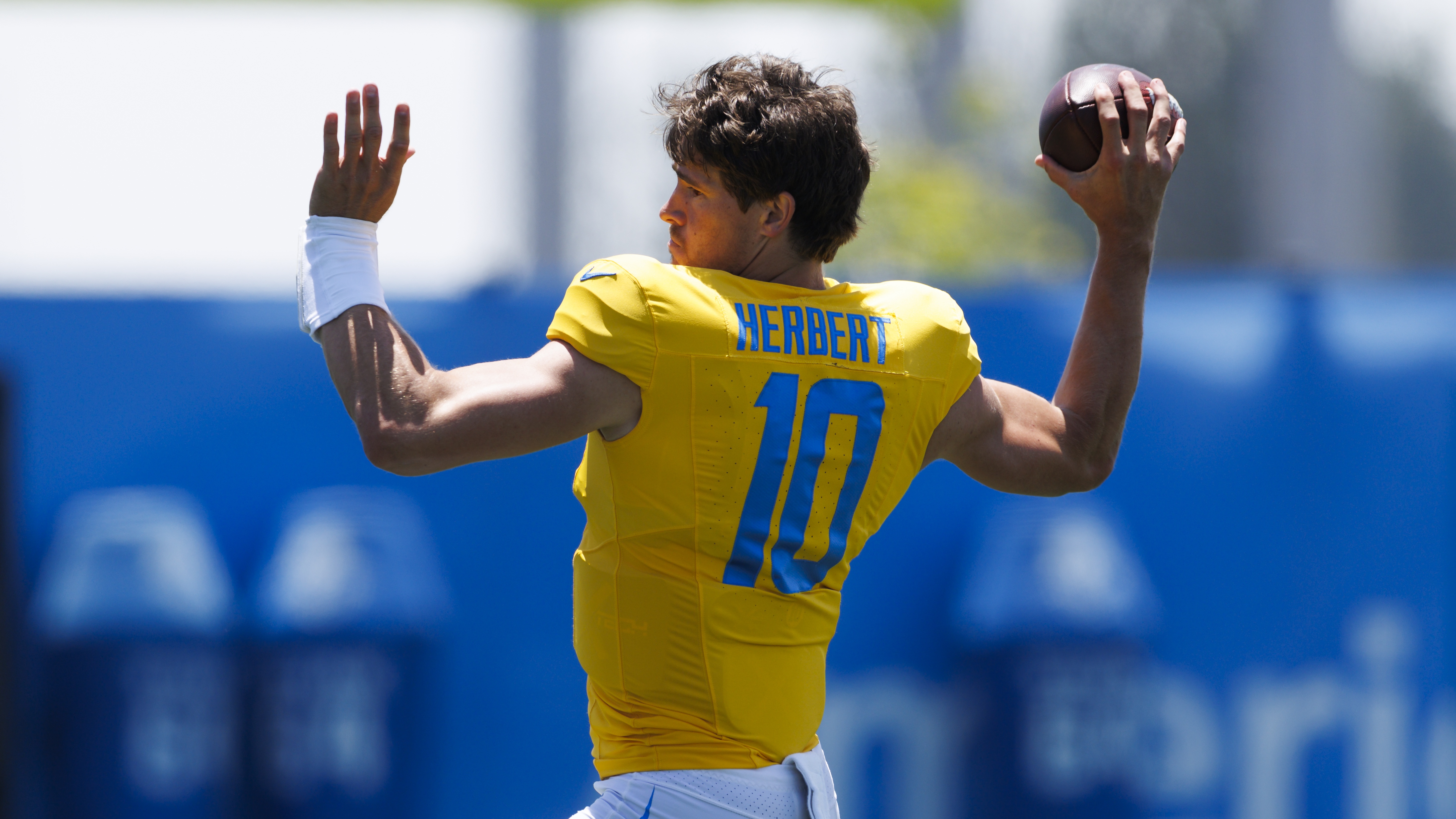 Justin Herbert #10 of the Los Angeles Chargers throws during training camp practice at The Bolt on July 24, 2025 in El Segundo, California. 