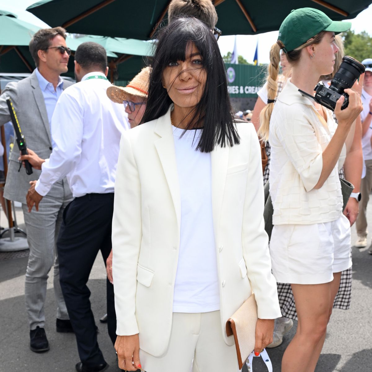 An image of Claudia Winkleman wearing jazz shoes to Wimbledon 2026.