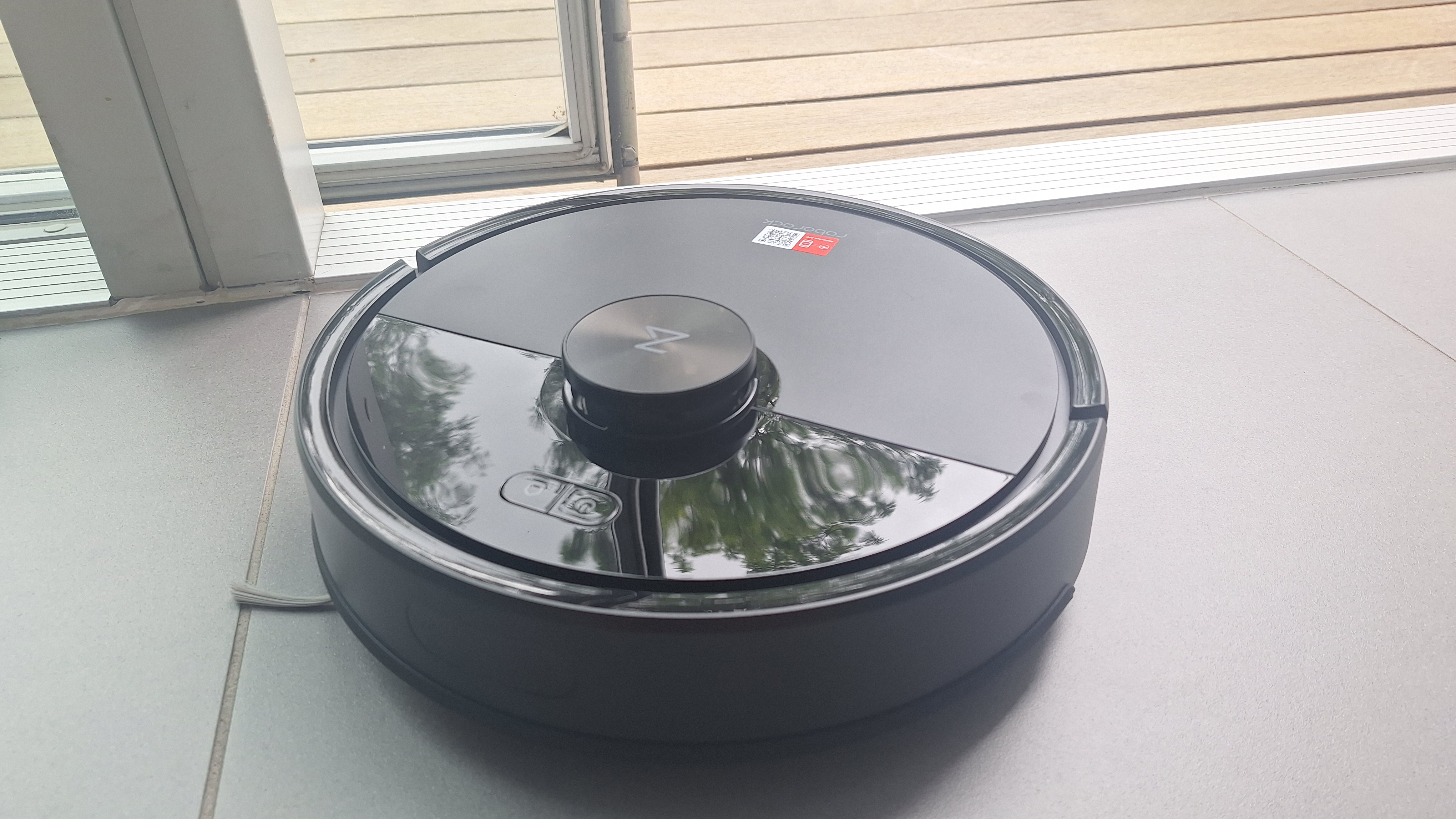 Roborock Q7 M5 robot vacuum on tester&#039;s kitchen floor