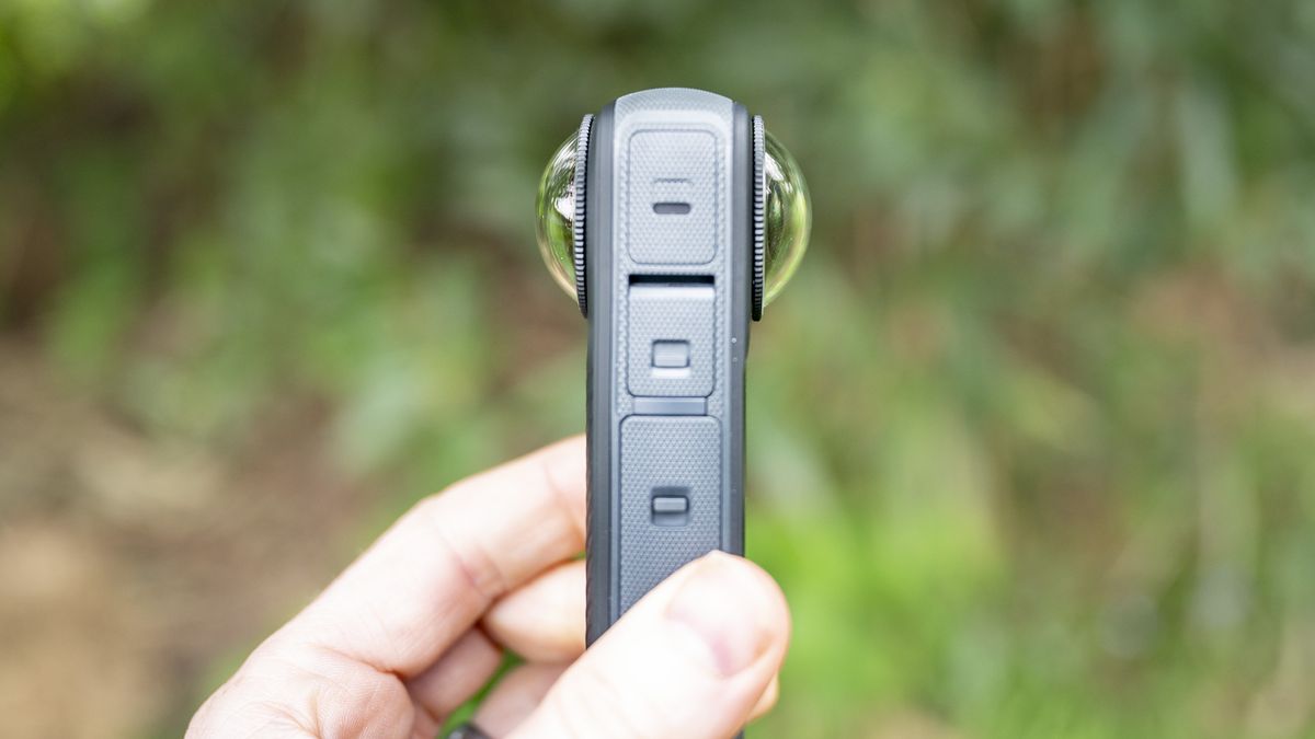 Side view of the Insta360 X4 360 degree camera with lens protectors