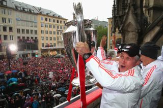 Jupp Heynckes with the Champions League trophy during Bayern Munich's treble celebrations in June 2013.