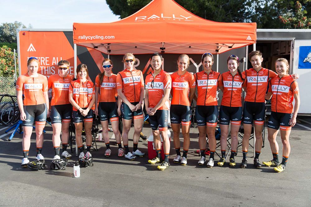 Rally Health COO David Ko flanked by the Rally Cycling women's team before the cew embarked on a group ride in Torrance.