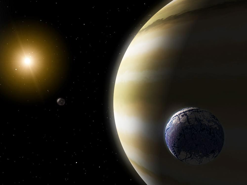 An exomoon circles a gas-giant planet in this artist&#039;s impression. Exomoons may detach when their parent planets migrate inward, becoming &quot;ploonets&quot; that circle stars on their own.