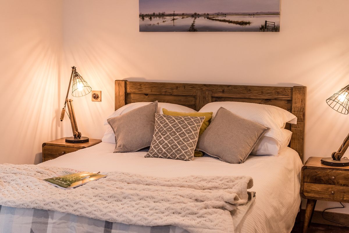 cosy bedroom in rustic self-build