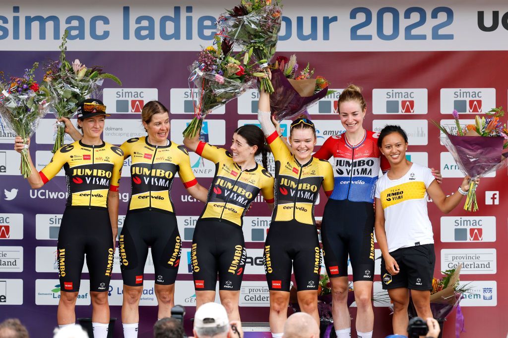 ARNHEM NETHERLANDS SEPTEMBER 04 A general view of Riejanne Markus of Netherlands Anna Henderson of United Kingdom Romy Kasper of Germany Coryn LabeckiRivera of United States Noemi Ruegg of Switzerland Karlijn Swinkels of Netherlands and Jumbo Visma Team celebrate winning the best team of the race on the podium ceremony after the 25th Simac Ladies Tour 2022 Stage 6 a 1503km stage from Arnhem to Arnhem SLT2022 UCIWWT on September 04 2022 in Arnhem Netherlands Photo by Bas CzerwinskiGetty Images