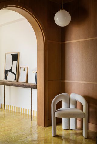 A brown curved entryway