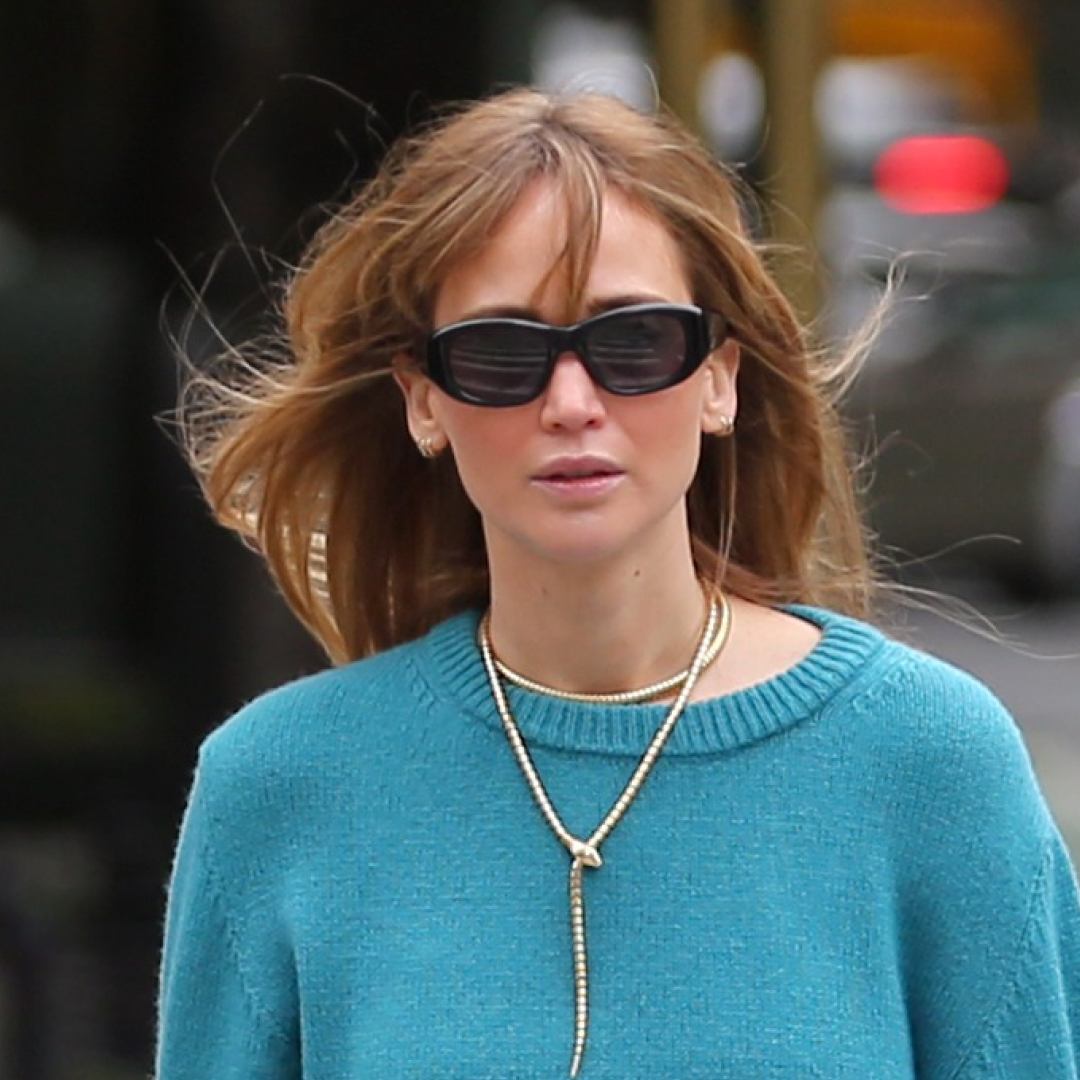 Jennifer Lawrence in New York City wearing the aqua color trend, transitional fall loafers, and carrying a rare Hermes Kelly bag