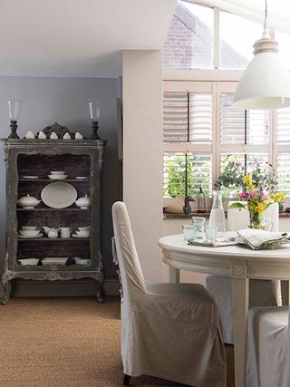 small dining table in garden room in 16th-century home