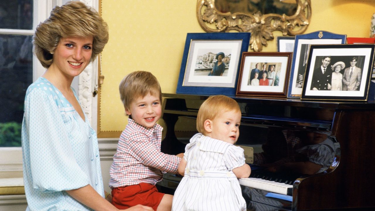 Diana, Princess of Wales with her sons, Prince William and Prince Harry, at the piano in Kensington Palace