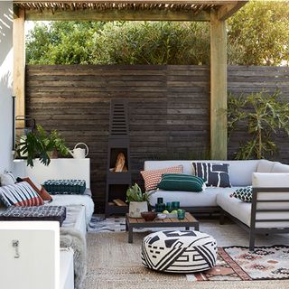 outdoor seating with white sofa