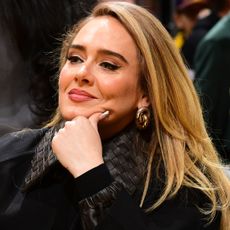 Adele made a surprise appearance in a dark-wash barrel jeans outfit for spring