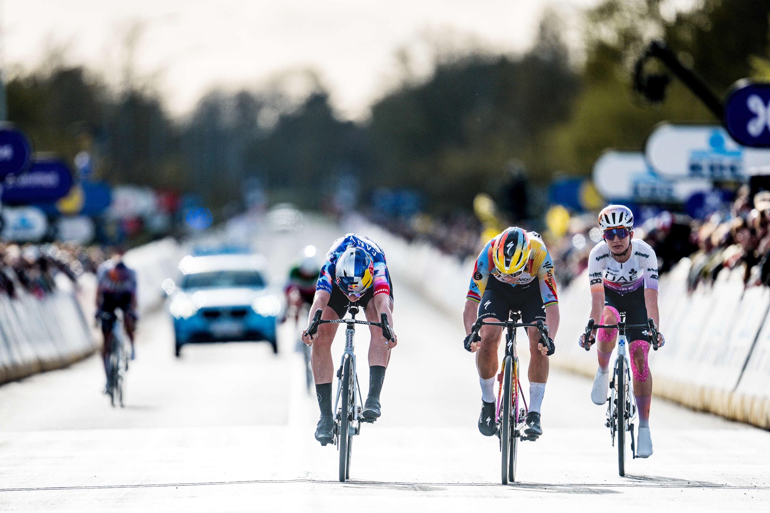 (L-R) Zoe Backstedt of CANYON//SRAM zondacrypto, Lotte Kopecky of SD Worx - Protime and Karlijn Swinkels of UAE Team ADQ sprint at finish line during the 23rd Tour of Flanders