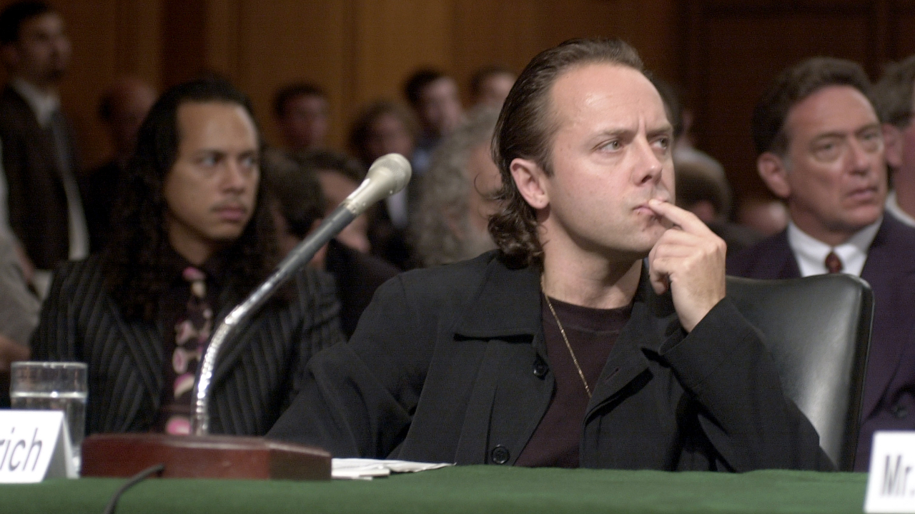 Lars Ulrich and Kirk Hammett looking thoughtful in court