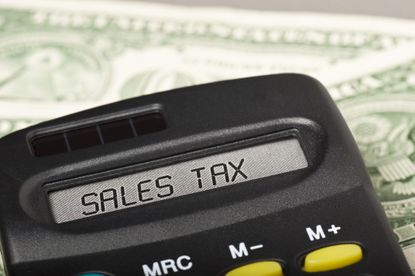picture of a calculator with "sales tax" on the screen