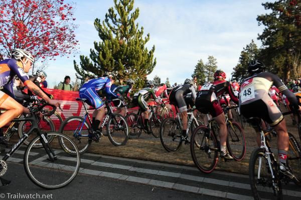 Elite men head off the pavement onto grass