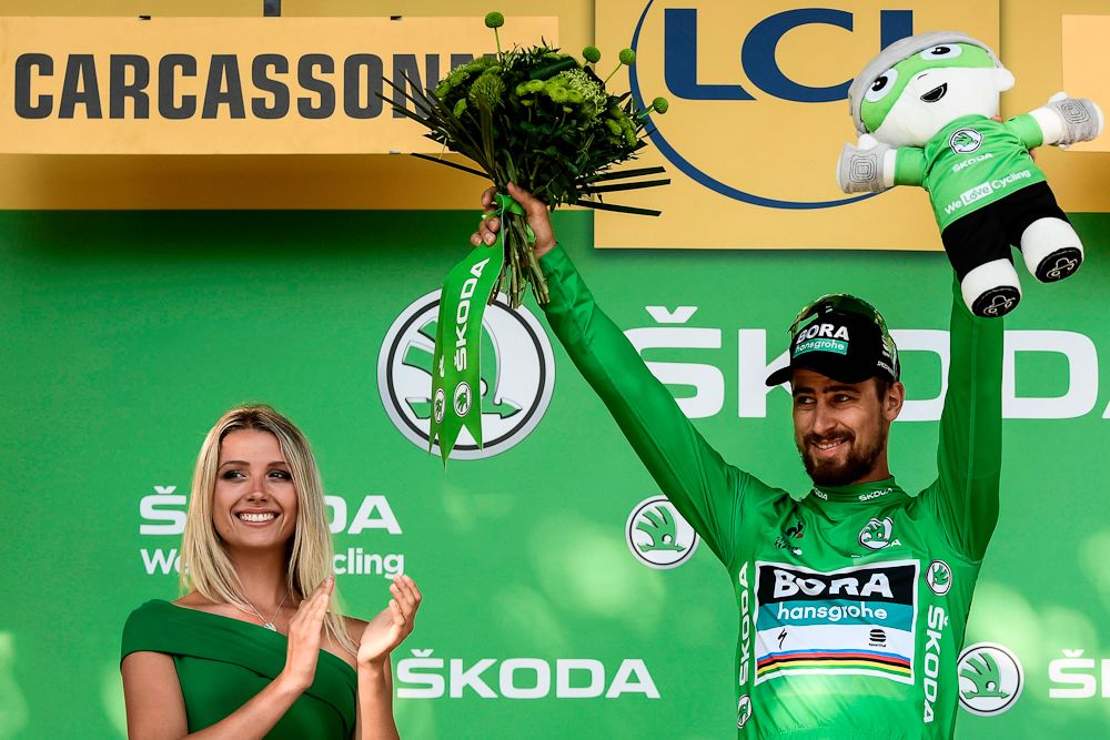 Peter sagan added to his lead in the points competition during stage 15