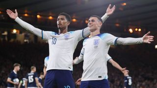 Jude Bellingham of England celebrates with Phil Foden after scoring his side's second goal during the 150th Anniversary Heritage Match between Scotland and England at Hampden Park on September 12, 2023 in Glasgow, Scotland.