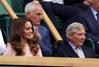 The Duchess of Cambridge, left, watches the Wimbledon men's wheelchair singles final