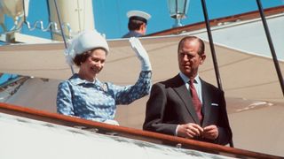 The Queen And Prince Philip Waving On Board Royal Yacht Britannia During An Official Visit To Kuwait During The Tour Of The Gulf (day Date Not Certain. Gulf Tour Dates 12 Feb - 1 March 1979)