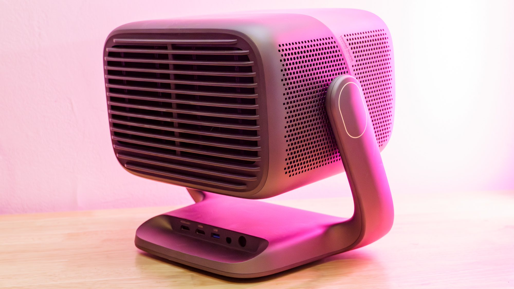 A JMGO N3 Ultimate projector on a desk