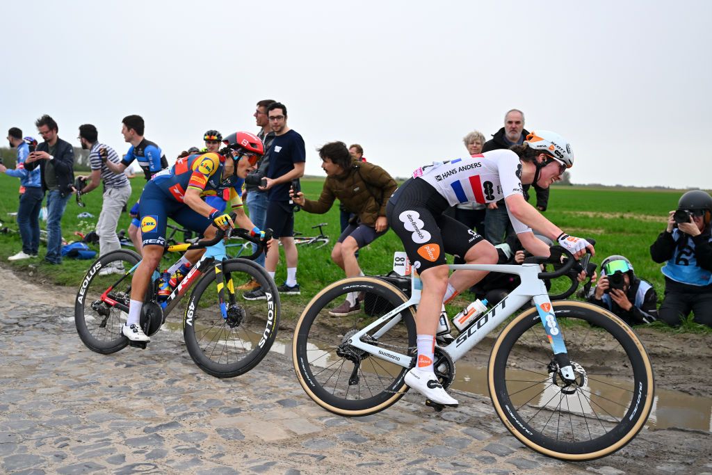 ROUBAIX FRANCE APRIL 06 LR Elisa Balsamo of Italy and Team Lidl Trek and Pfeiffer Georgi of The United Kingdom and Team dsmfirmenich PostNL compete passing through the Carrefour de lArbre cobblestones sector during the 4th ParisRoubaix Femmes 2024 a 1485km one day race from Denain to Roubaix on UCIWWT April 06 2024 in Roubaix France Photo by Luc ClaessenGetty Images