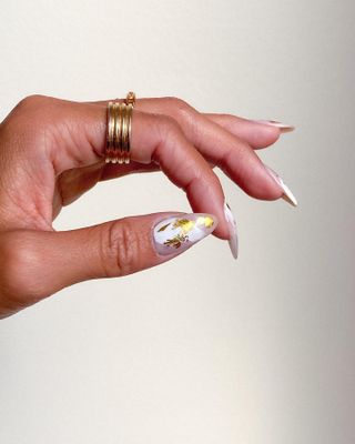 Gold-foiled, brushstroke manicure by Brittney Boyce