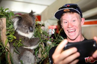 Lawson Craddock gets a selfie with a koala in the race village