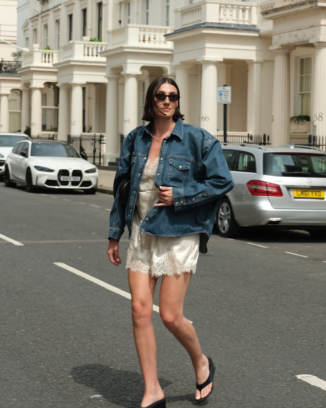 Sarah wearing lace shorts and flip flops
